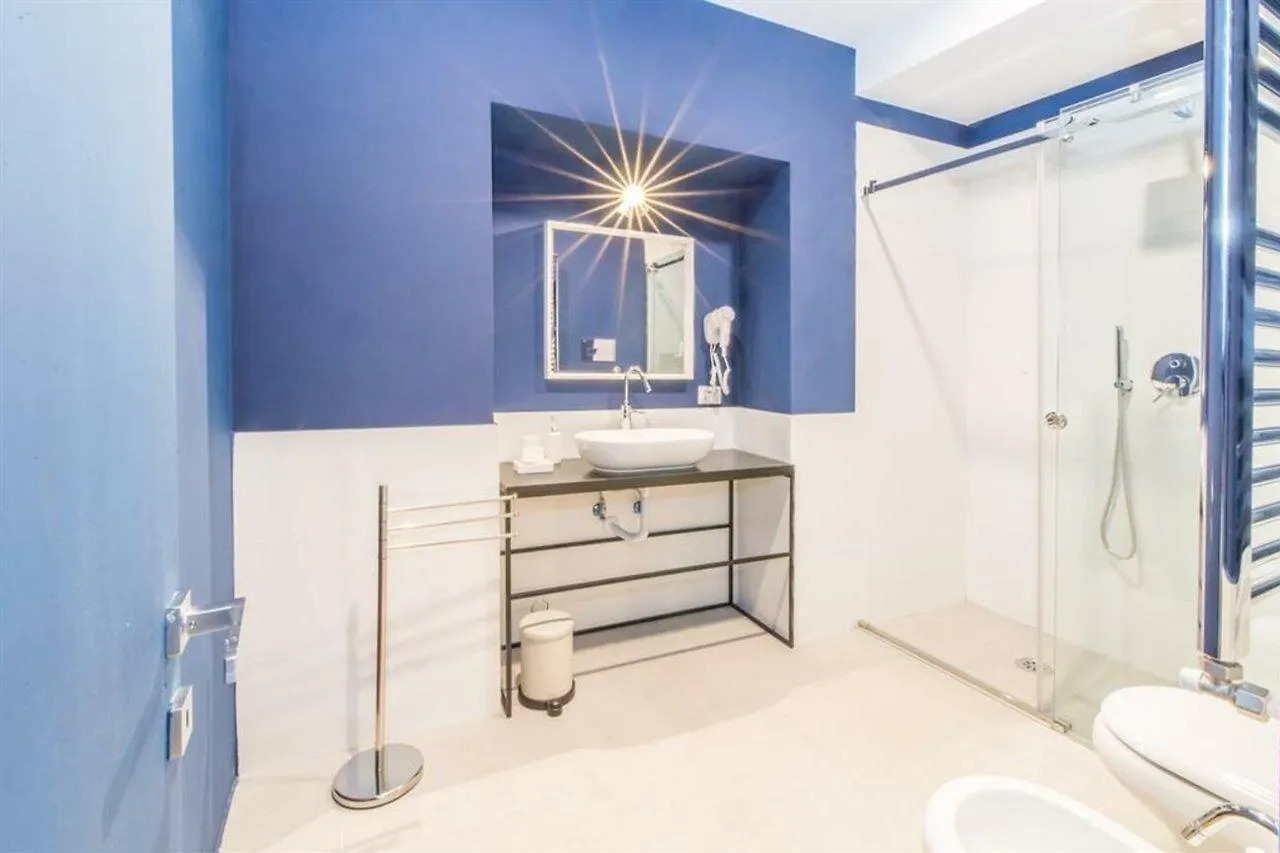 Dama Suite Naples Couette-café